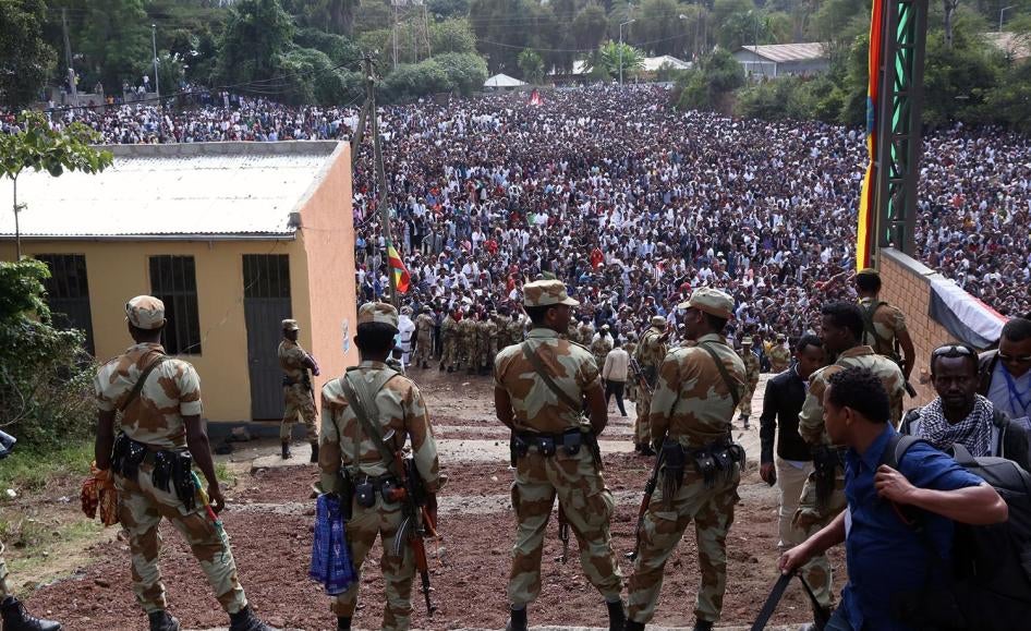 Armed security forces watch during the Irreecha cultural festival in Bishoftu, Ethiopia on October 2, 2016. 