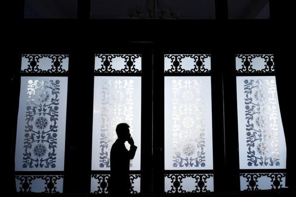 A man talks on the phone in Beijing, China, March 2, 2017.