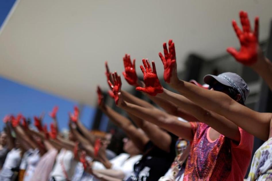 Demonstrators attend a protest against rape and violence against women in Brasilia, Brazil, May 29, 2016. © 2016 Reuters