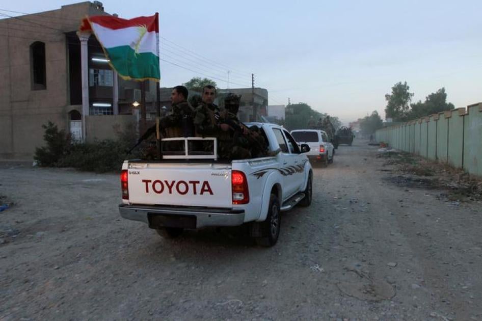 Kurdistan Regional Government security forces patrol a street in the city of Kirkuk, Iraq, October 22, 2016. 