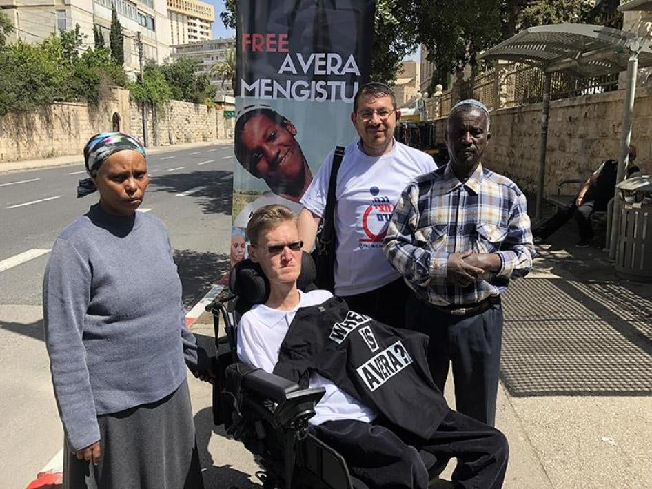 Avera Mangistu’s parents and disability rights activists at a protest tent in Jerusalem.