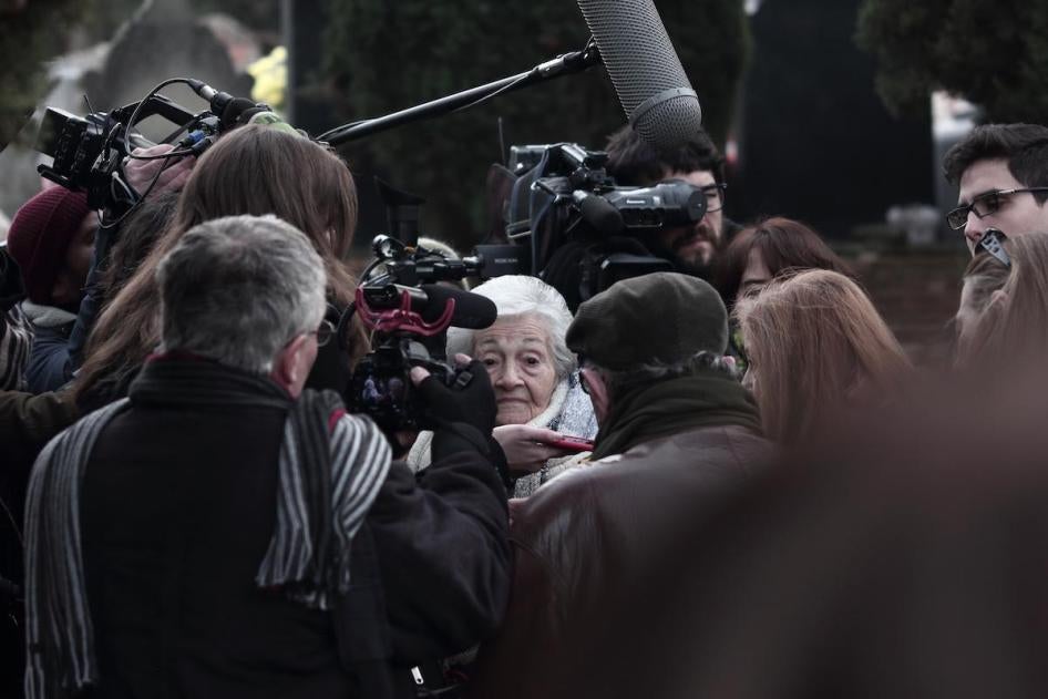 Ascensión Mendieta enters the cemetery where her father’s remains have are buried in a mass grave.