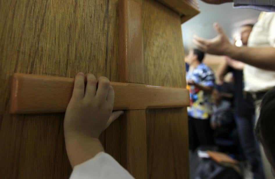 A Protestant Berber boy attends a weekly mass at a church in Tizi-Ouzou, 100 kilometers east of Algeria's capital, Algiers, October 2, 2010.