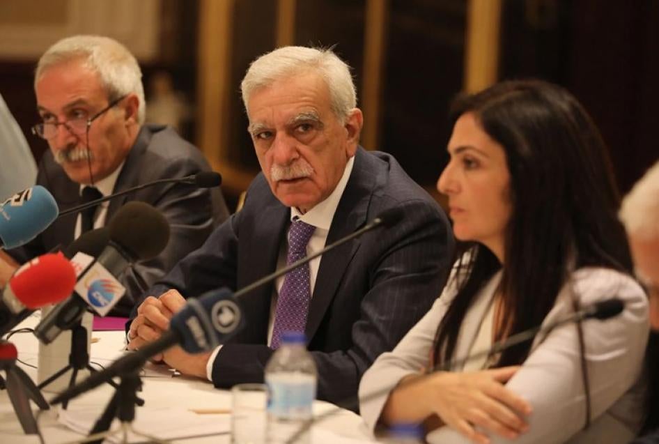 Dismissed Peoples’ Democratic Party (HDP) mayors Adnan Selçuk Mızraklı, Ahmet Türk, and Bedia Özgökce Ertan speak at a press conference in Istanbul. 