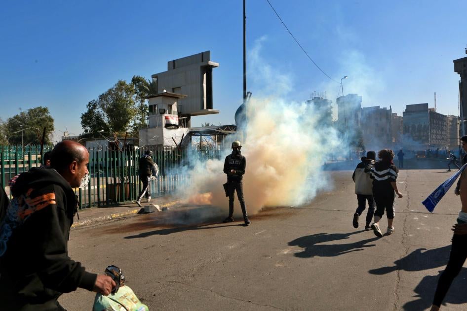Security forces fire tear gas at protesters in Baghdad, Iraq, on January 27, 2020.