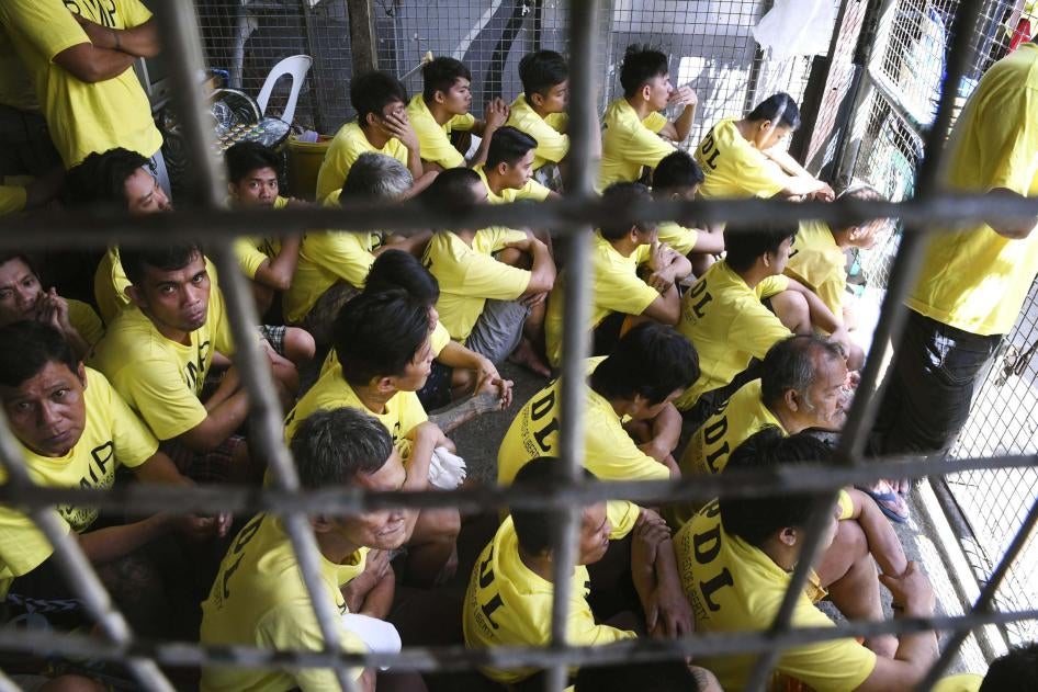 Inmates sitting in an overcrowded jail in Manila, Philippines, February 2019. 