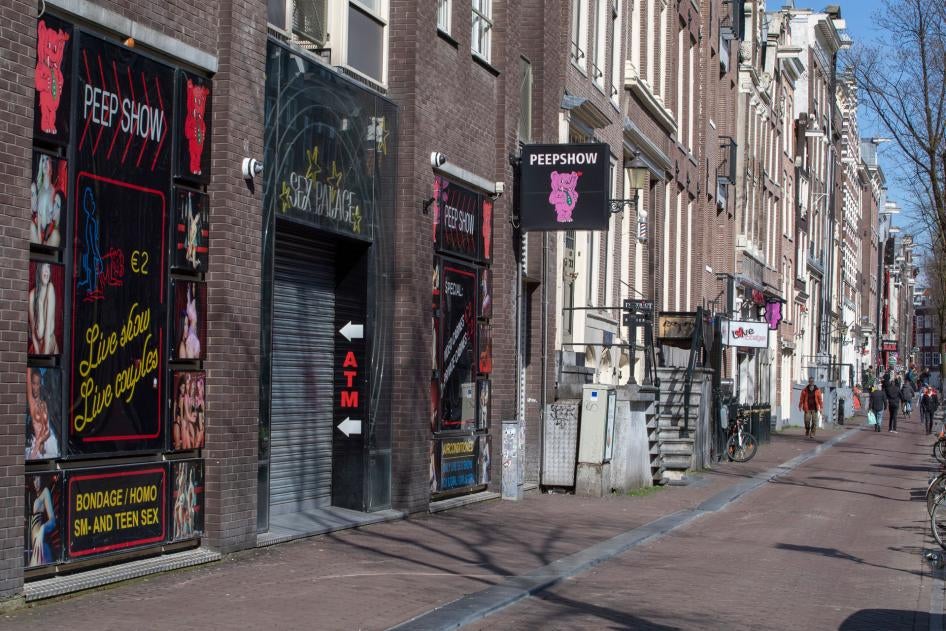 The narrow streets and alleys of Amsterdam's famed Red Light District, normally packed with tourists, seen largely deserted, March 16, 2020.