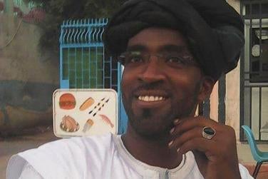 Photo of a man smiling