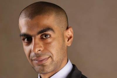 Photo of a man in a suit