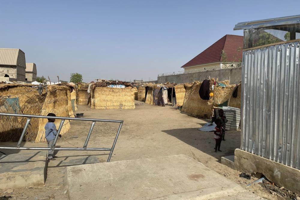 A group of thatched tents in an IDP camp