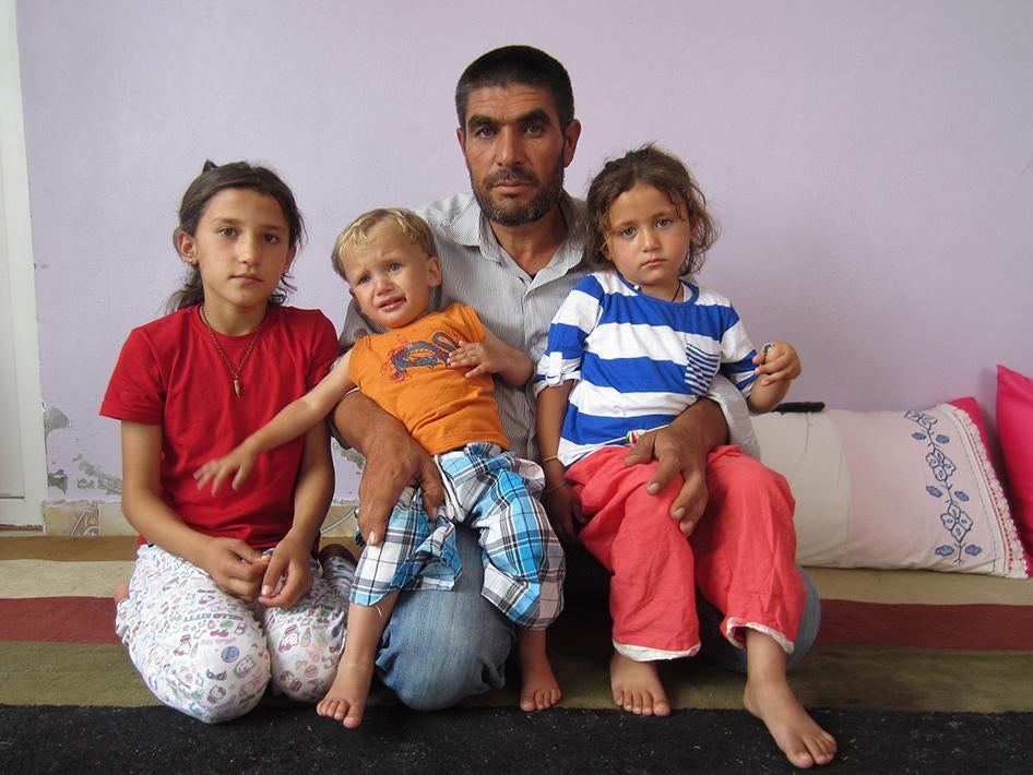 Mohammed, 42 and three of his relatives who were orphaned in the attack on June 25, 2015 in Kobani, Syria. 
