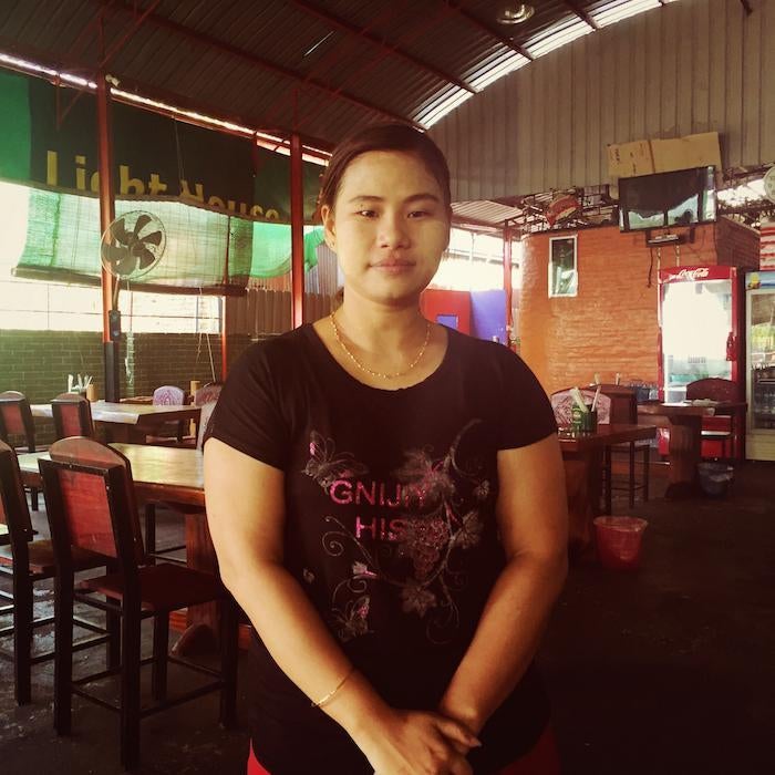 Moe Moe went to the polls early before work. "Not too exciting," she said; the outcome "may be good, may be bad." But she doesn't bear a "purple pinky" indicating that she's already voted. "I washed it off," she shrugs. Other voters in Moulmein have also 