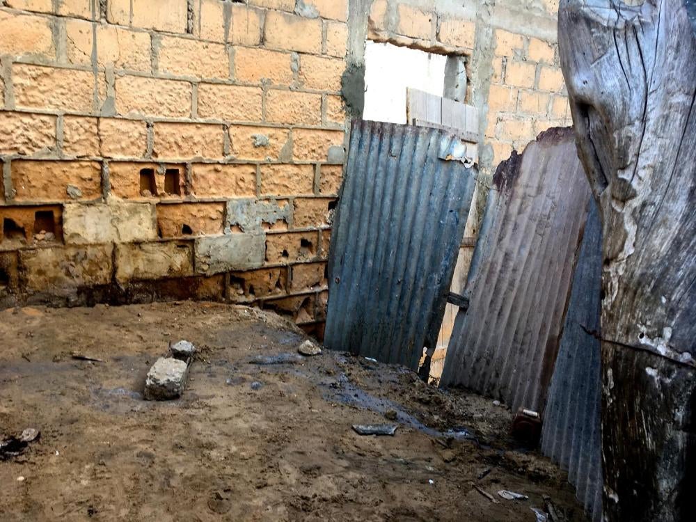 The “bathroom” area for talibés living at a daara [Quranic school] in Saint-Louis, Senegal. The children urinate here on the ground; for anything else, they “go to the river.” May 1, 2017. 