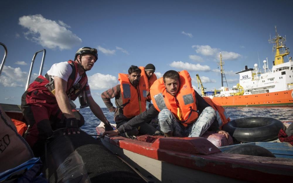 A young Syrian man who was traveling with his pregnant wife prepares to get on the SOS MEDITERRANEE speedboat for transfer to the Aquarius. October 10, 2017