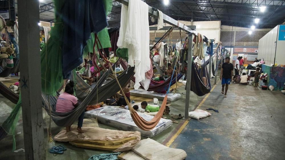Members of Venezuela’s Warao indigenous community prepare to go to sleep at a shelter for Venezuelan immigrants in Boa Vista, Roraima state, Brazil on August 27, 2018. 