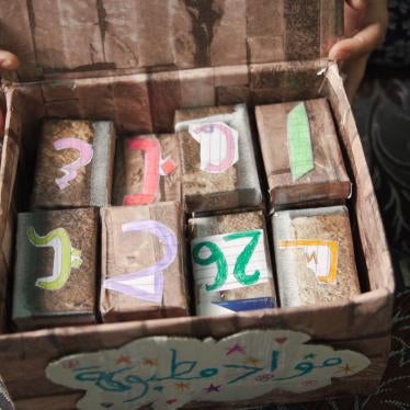 Hanan, a Syrian refugee in Jordan, created learning ‘blocks’ for her children from discarded cigarette cases.