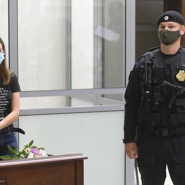 Russian journalist Svetlana Prokopyeva (left) attends the trial in the Second Western District Military Court.