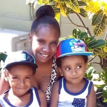 Charlie Gowa (left), his mother Xernona PoiPoi, and brother Richard.