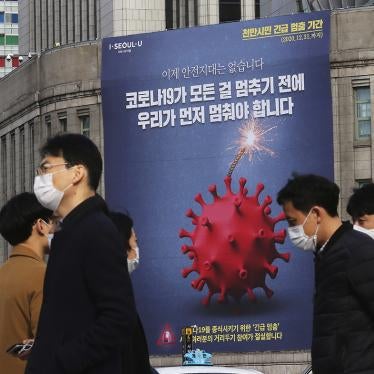 A banner emphasizing enhanced social distancing is displayed at Seoul City Hall in Seoul, South Korea on November 25, 2020. © 2020 AP Photo/Ahn Young-joon