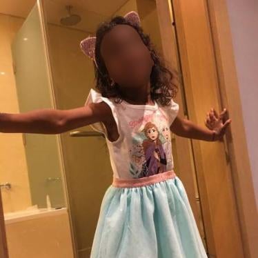 A 4-year-old Canadian girl after her rescue from a detention camp