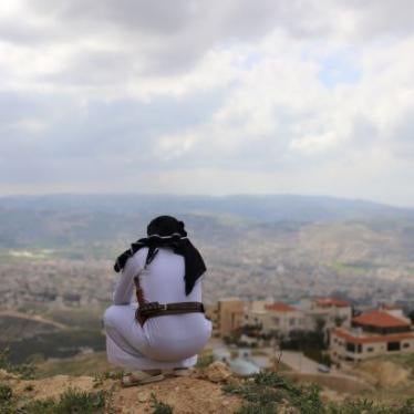A Yemeni asylum seeker who arrived in Jordan in 2014, overlooks the city in the neighborhood of Abu Nseir, North of Amman, Jordan on March 25, 2021.