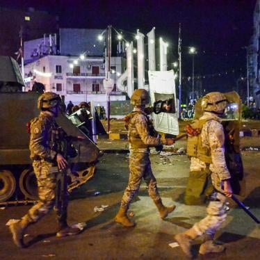  Security forces force anti-government protesters away from al-Nour square in the center Tripoli, Lebanon, on January 31, 2021 amidst clashes.