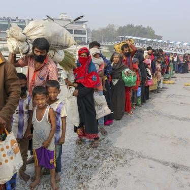 Rohingya refugees headed to the Bhasan Char island prepare to board navy vessels from the south eastern port city of Chattogram, Bangladesh on Feb.15,2021. © 2021 AP Photo 