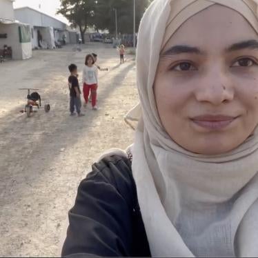 A refugee girl living in a camp near Athens.