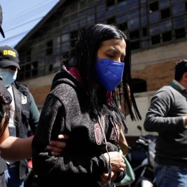 Anti-corruption prosecutor Leily Santizo is escorted by police officers to the Supreme Court of Justice in Guatemala City, Guatemala, on February 10, 2022.