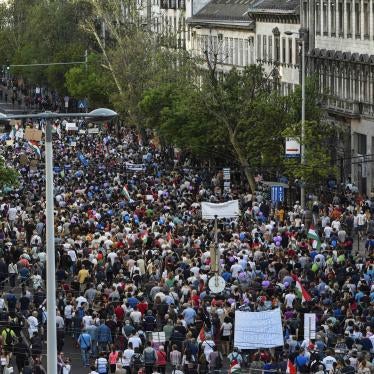 Thousands of people take part in a rally against the Hungarian government's distorting media policies and campaign against civic groups.