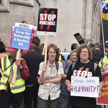 Protesters gathered opposite The Royal Courts Of Justice over UK's agreement with Rwanda. 