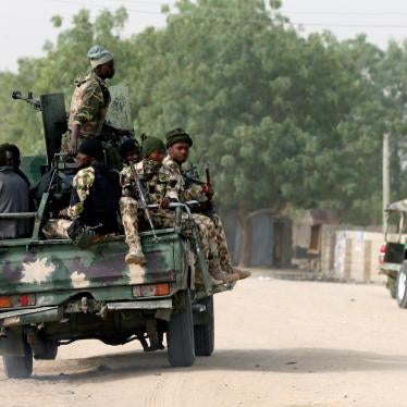 Nigerian military ride on their truck in Maiduguri. 