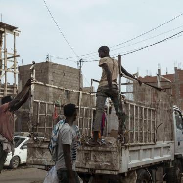 Ethiopian migrants climb on a pickup truck in Dhale province in Yemen.