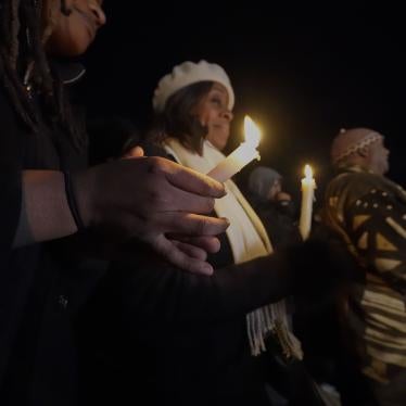 People hold candles at a vigil for Tyre Nichols in Memphis, Tennessee