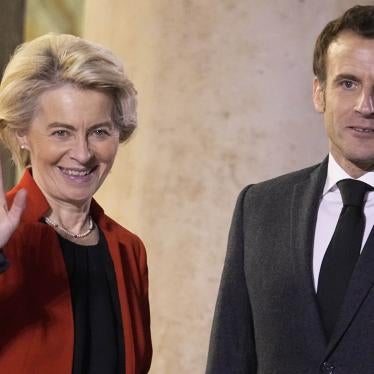 France's President Emmanuel Macron, right, welcomes European Commission President Ursula von der Leyen, at the Elysee Palace, in Paris, December 12, 2022.