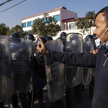 Nepalese youth clash with police as they protest outside Federal Parliament in Kathmandu, Nepal.