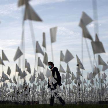 A white flag memorial installation outside Griffith Observatory honoring the nearly 27,000 Los Angeles County residents who had died from COVID-19 .