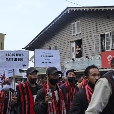 Ethnic Nagas hold placards and participate in a 70-kilometer walk demanding the repeal of the Armed Forces Special Powers Act (AFSPA) in Kohima, Nagaland, India in 2022.