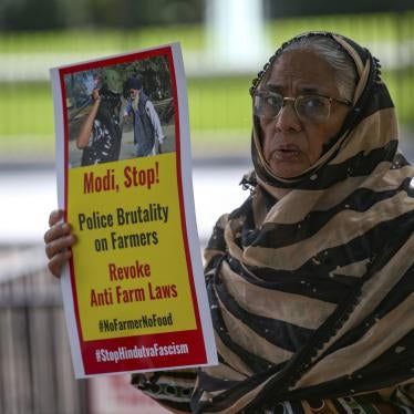 A demonstrator outside the White House in Washington, DC, protests Indian Prime Minister Narendra Modi during his visit to the United States, September 23, 2021.