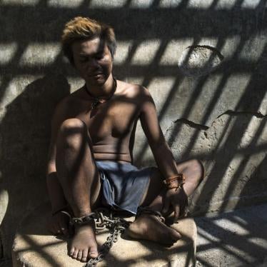 This man with a real or perceived psychosocial disability is one of the residents at Marsiyo’s House, a private family-run social care facility in Kebumen, Central Java, Indonesia. The crumbling shelter where he is chained leaves him exposed to hours of direct sunlight and constant dust.