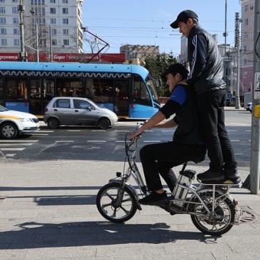 Two work migrants from Central Asia in Moscow, Russia, April 14, 2023.