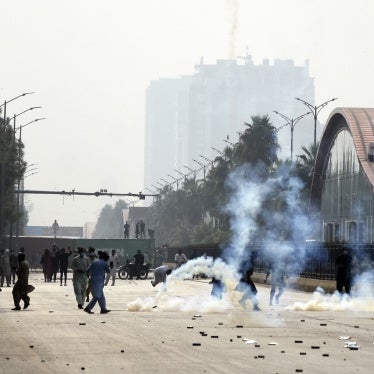 Police officers fire tear gas to disperse the supporters of imprisoned former Prime Minister Imran Khan's Pakistan Tehrik-e-Insaf party, during a protest in Islamabad, Pakistan, October 5, 2024.