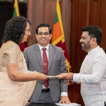 Sri Lankan President Anura Kumara Dissanayake (right) and Prime Minister Harini Amarasuriya during the swearing-in of the new cabinet members on November 18, 2024, in Colombo, Sri Lanka.
