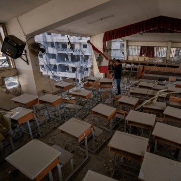 Teacher Ahmed Awada inspects his school that was damaged by an Israeli airstrike in Dahiyeh, Beirut, Lebanon, November 29, 2024