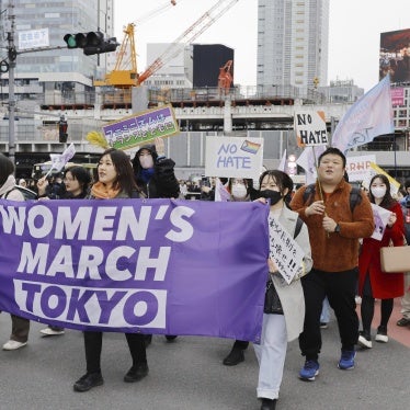 People march in an International Women's Day demonstration