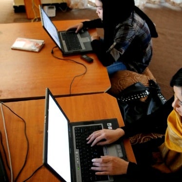 In July 2012, Afghan women and girls visit an internet cafe called "Young Women for Change" in Kabul, Afghanistan. 