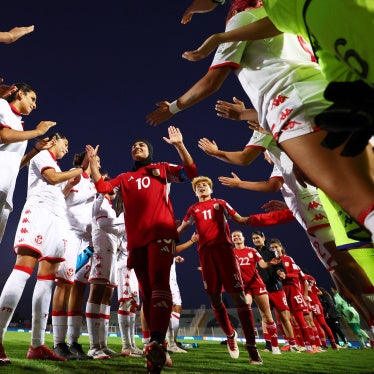 Players of Afghan Women's United football team receive support from Tunisian players after the FIFA Unites: Women's Series 2025 on October 29 in Casablanca, Morocco. 