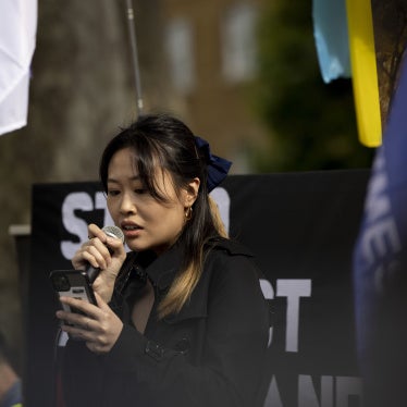 Carmen Lau, a Hong Kong pro-democracy activist in exile, speaking during a rally at Downing Street, London, June 4, 2022.
