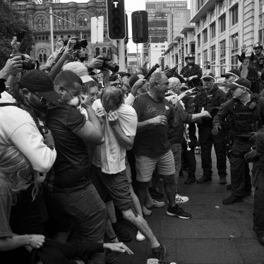 Police confronting a group of protesters