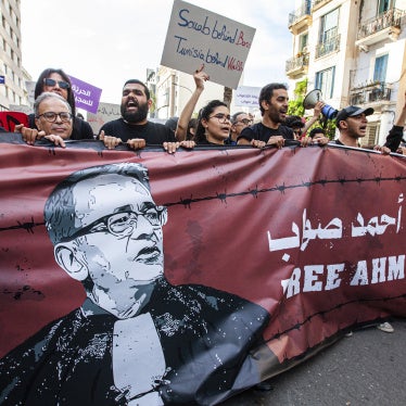 Supporters show support for the lawyer and human rights defender, Ahmed Souab, who was arrested on terrorism-related charges, in Tunis, Tunisia, April 25, 2025.